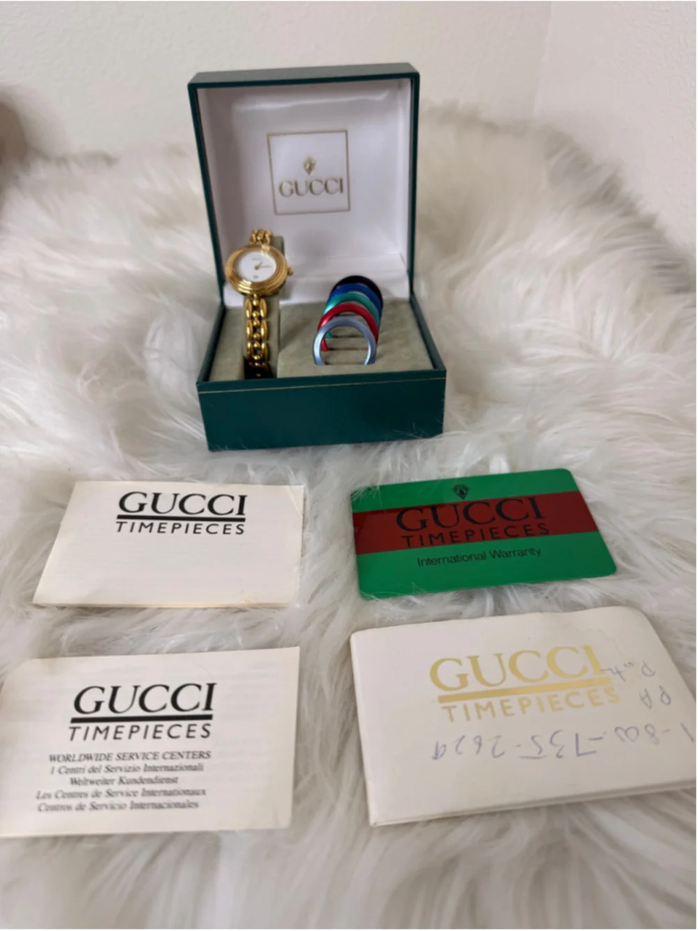 Gucci Interchangeable Bezel Rice Link Watch, w/ 6 metal bezels, box & paperwork